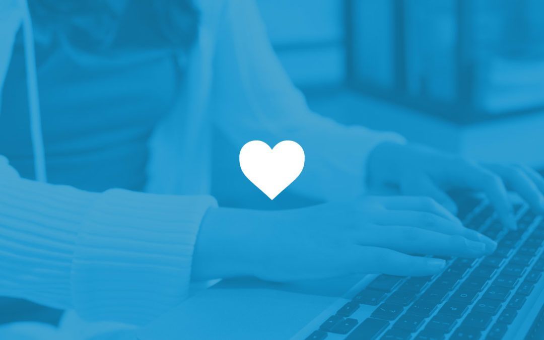 Picture of student hands on keyboard during lesson with heart over top