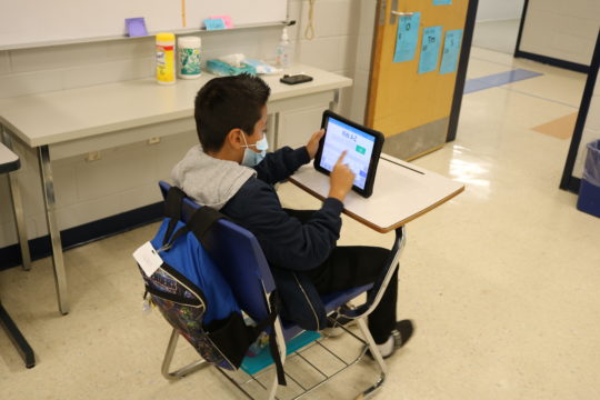 Madison County Schools student at desk