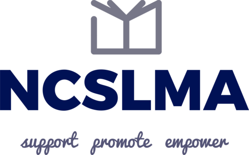 transparent-logo-web (1) Group of learners around computer smiling