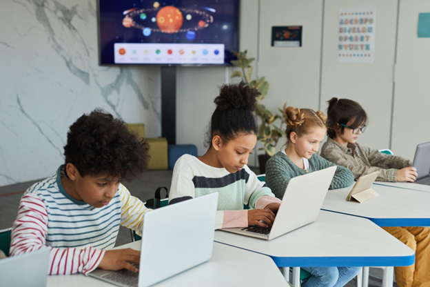 Group of students doing AI classroom activities