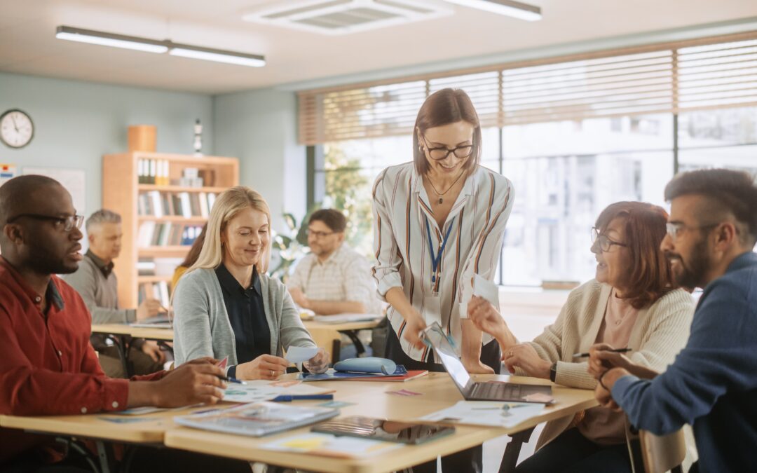 Teachers in a classroom engaging in professional development