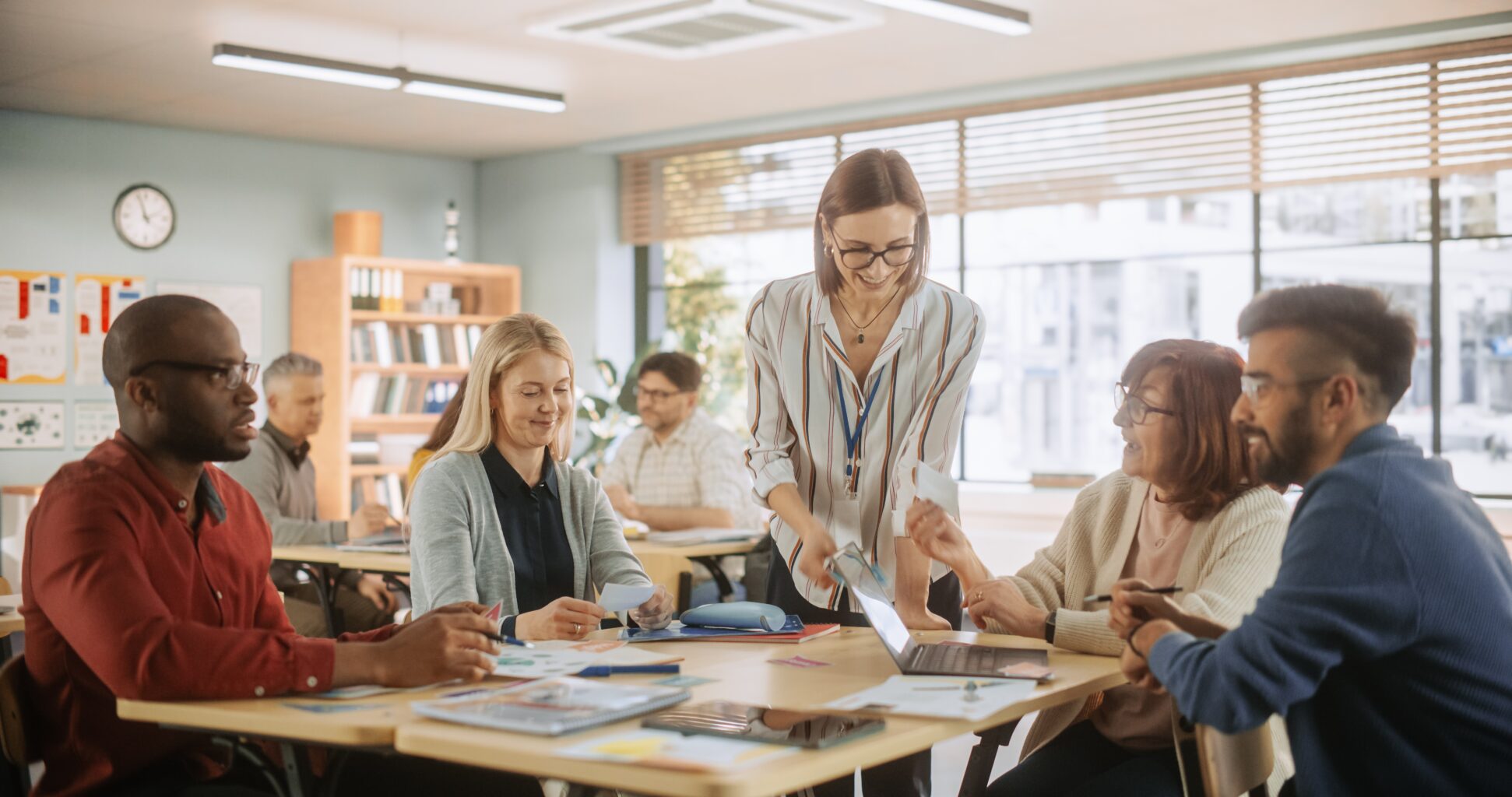 Teachers in a classroom engaging in professional development