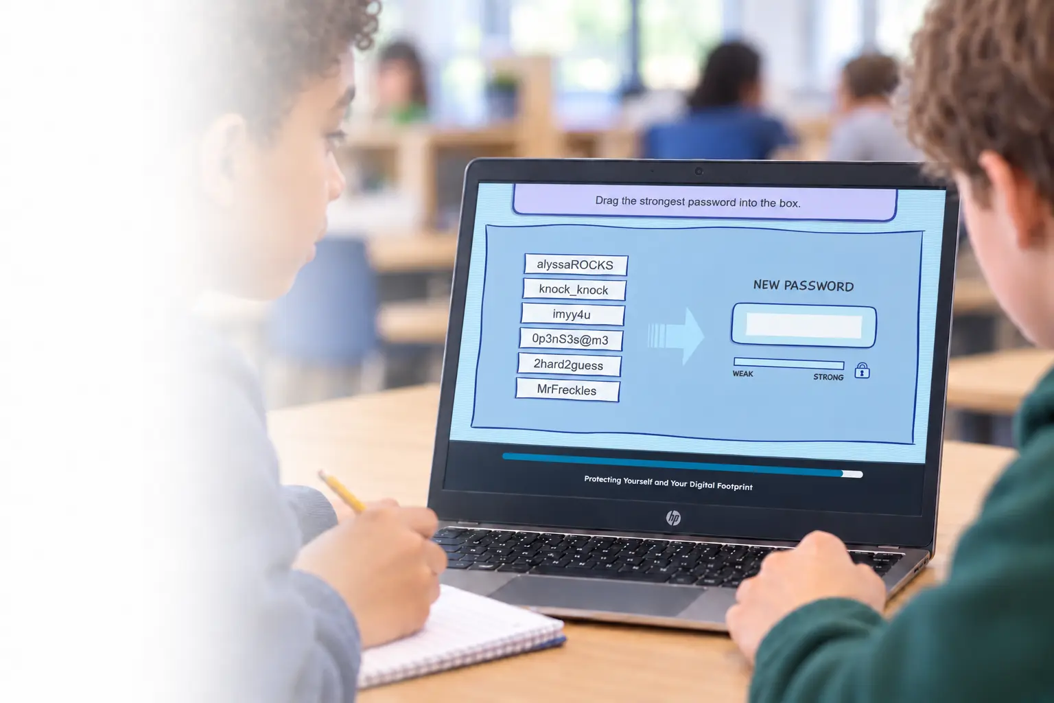 Two students use an EasyTech lesson to identify a strong password